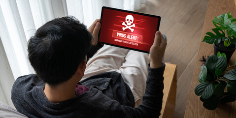 Virus warning alert on computer screen detected modish cyber threat , hacker, computer virus and malware