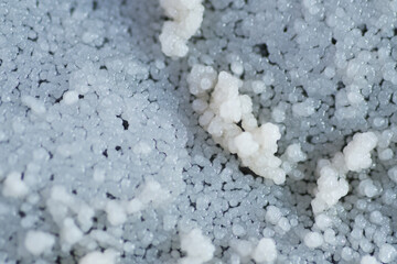 Form of white dots on bottle surface on expired cooking palm oil