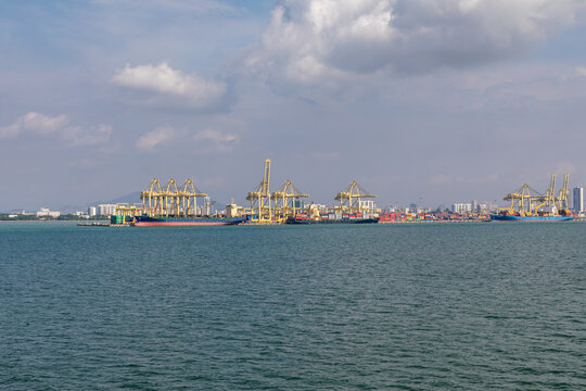 Cranes and Container Ships in the Harbor of Butterworth, Penang, Malaysia