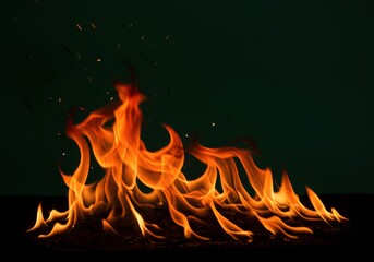 Fiery Inferno Abstract Orange Flames on Black Background