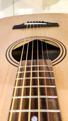 Fototapeta premium Guitar.Guitar chords.Acoustic guitar.Playing music with the guitar.