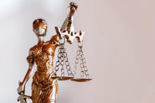  fairness concept.Lady Justice Statue with Scales of Justice on a light background.Law and right symbol.fair trial 