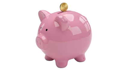 Piggy bank sitting on a surface with a coin on top in a well-lit room during daytime