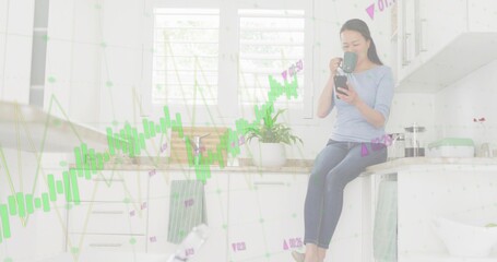 Checking woman in casual clothes scrolling phone at home counter, mug and chart overlay, copy space