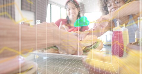 Reaching friends grabbing burgers on wooden table at cafe, with ketchup mustard bottles, AR overlay