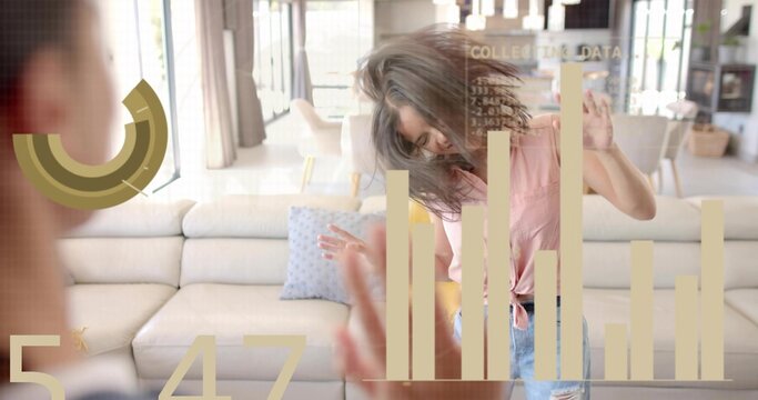 Reaching adult woman wearing pink tied top and ripped jeans, high-fiving on sofa with data overlays - Powered by Adobe