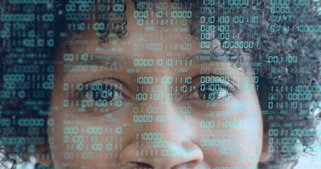 Showing mid-adult woman gazing through translucent binary overlay in studio, digital data motif