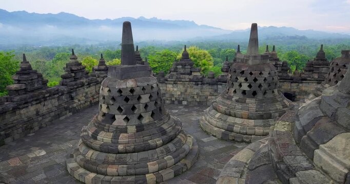 Stone Stupas of Borobudur Temple at Sunrise, Indonesia