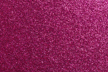 A pink background with glittery texture