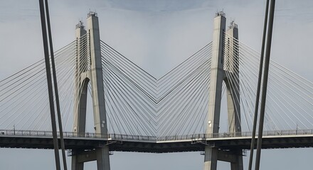 Fototapeta premium Symmetric marvel of modern engineering, a striking cable-stayed bridge structure reaching towards the sky, representing architectural innovation and connectivity