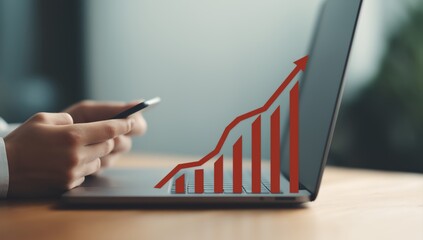 Hands holding phone with growth chart overlaying laptop screen, symbolizing business success, financial progress, and data analysis