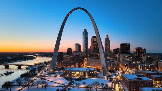 St Louis Gateway Arch at dusk with city skyline