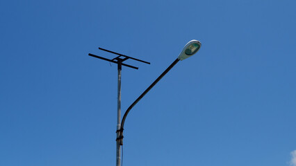 Electric poles and power cables with street lights