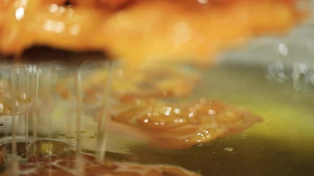 Sugary Indian dessert "Jalebi". Traditional Indian sweet.