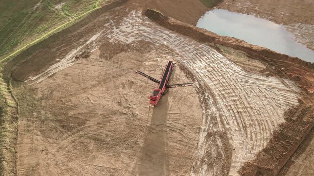 Aerial View Of Screener Machine At Construction Site - Drone Shot