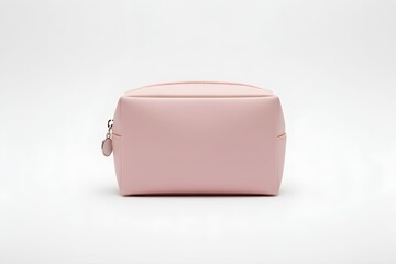 A pale pink leather pouch with a zipper and charm on a plain white surface viewed from the back