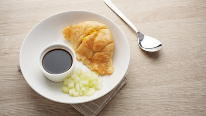 Pempek Kapal Selam with cuko sauce, Indonesian food