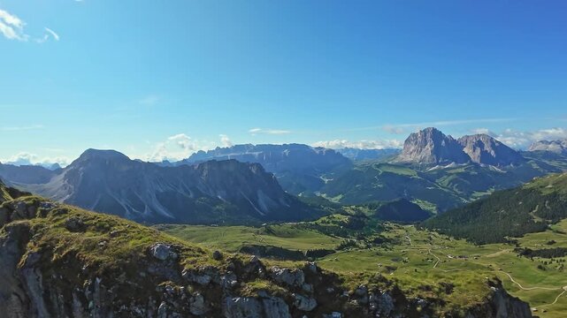 Dolomites, Italy, Seceda Panoramic View Alpine Plateau Seceda With Rolling Meadows And Distant Jagged Peaks, Sunlit Pastures, Winding Trails, Bright Blue Sky, Tranquil Rural Atmosphere,