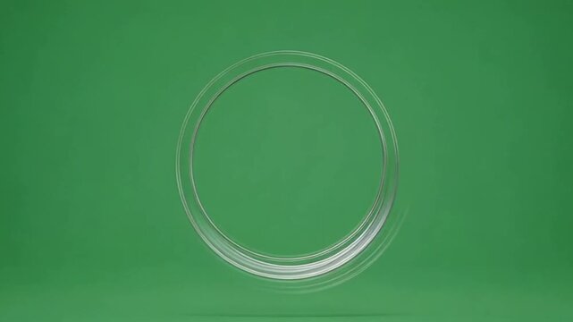 3D rendering of a white circular loading bar or progress spinner against a solid green background, representing a waiting process or system update.