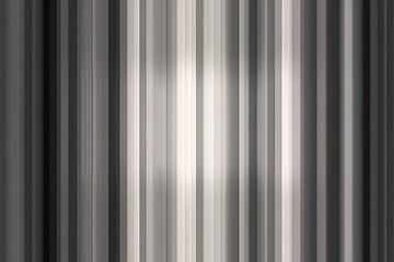 Vertical blurred stripes in monochrome gradient, ranging from dark to light, creating a simple pattern