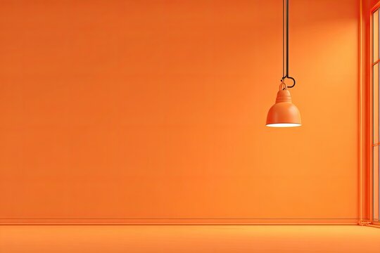 Modern empty room in orange hue with pendant lamp and window