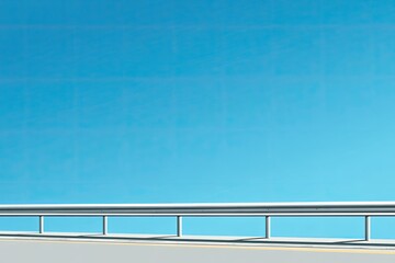 View of highway guardrail with blue sky
