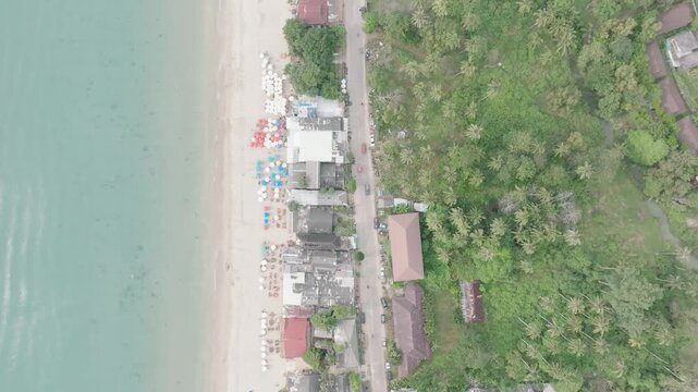 Aerial Beach Resorts at Klong Nin Koh Lanta Thailand, Vertical coastline panning view