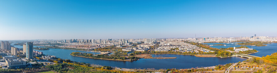 Aerial view of the urban architectural scenery and autumn landscape of Qingfeng Lake in Dongying, Shandong, China