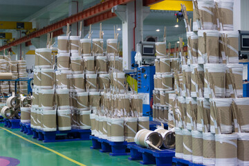 Coils of wire assembled and stacked ready for installation in transformers