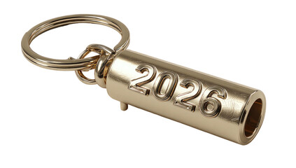 A gleaming gold cylindrical keychain with the year 2026 embossed, against a stark black background
