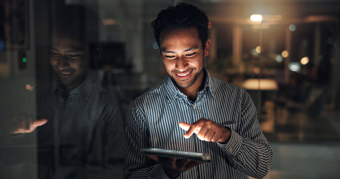 Tablet, happy and businessman in office at night with finance report for budget planning deadline. Digital technology, overtime and financial manager with feedback on investment deal in workplace.