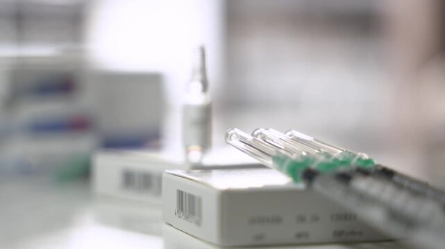 Focus Pull from Syringes to Testosterone Ampoule, TRT Clinical Concept