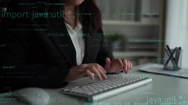 A business professional engages in programming on a computer, showcasing Java code in a modern office. The focus on coding highlights innovation and technology in the workplace. Xenic