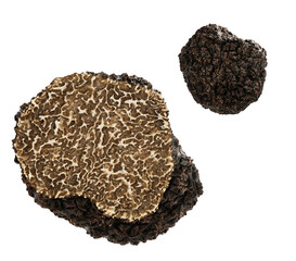 Two premium black truffles one whole and one sliced are presented on a dark background The cut truffle reveals its exquisite marbled gleba a distinct culinary delicacy