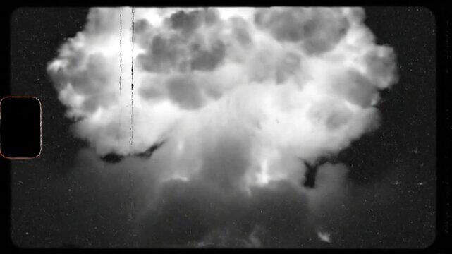 Vintage Atomic Explosion Sequence Reel With Grain and Film Artefacts Showing Mushroom Cloud