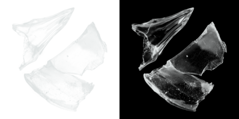 Shattered glass pieces on black and white backgrounds