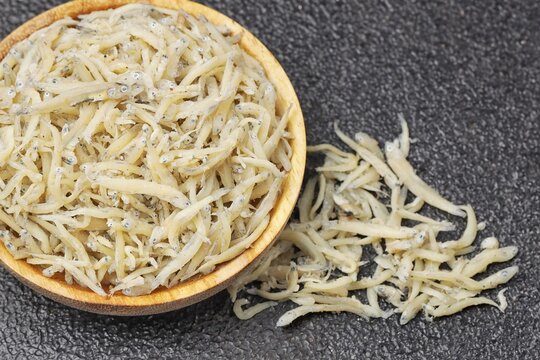 Close-up of dried anchovies piled, teri nasi or teri medan