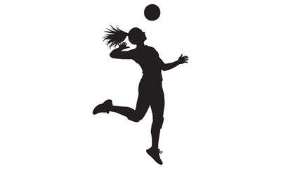 Silhouette of a female volleyball player jumping and spiking the ball during a game.