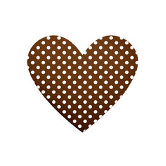 Brown heart shape with white polka dots, isolated on a black background