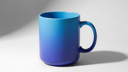 Fototapeta premium Blue Gradient Ceramic Mug on White Surface