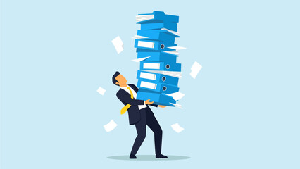 A suited office worker struggles to balance a precarious, towering stack of blue binders while loose papers scatter chaotically around him