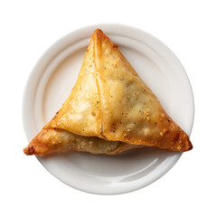 Crispy, golden-brown, triangular pastry sits atop a small white plate, centered
