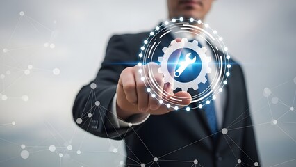 Businessman interacting with a digital globe and gear icon on a virtual screen.