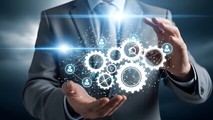 Businessman interacting with holographic gears and technology in digital workspace