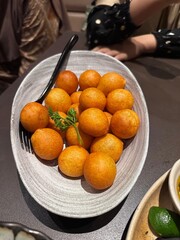 Bowl of golden sweet potato balls