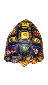 Ornate turtle shell, intricately detailed in blues, yellows, and reds, against white