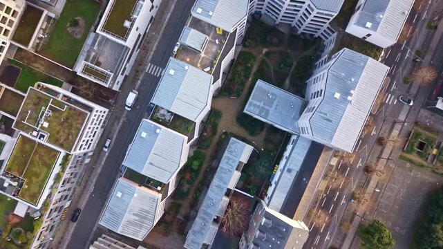 Top-down drone view showing rooftops and urban layout of Nantes