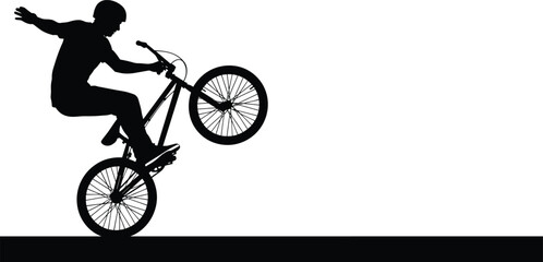 Obraz premium Silhouette Vector of a BMX Biker Performing a Wheelie Stunt on a Flat Ground Surface for Extreme Sports Action and Urban Youth Lifestyle Concepts