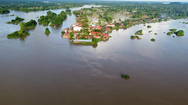 Riverside town and rice paddies on Don Det island, Laos