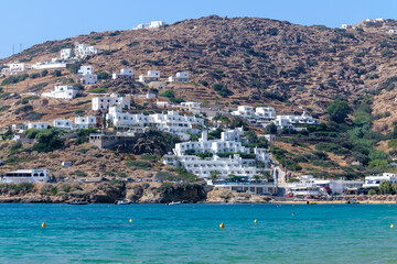 Panoramic view of various whitewashed hotels at the popular sandy beach of Mylopotas in Ios Greece